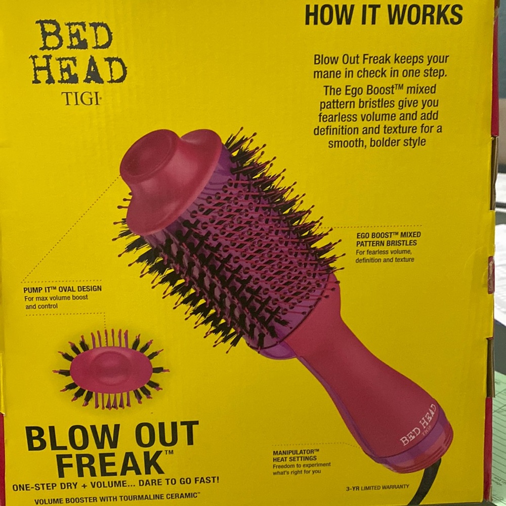New in box never opened Bed Head Blow Out Freak hot pink color!